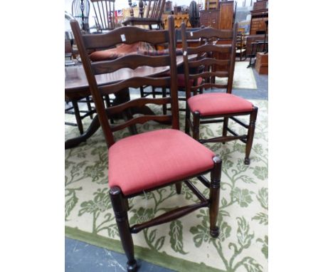 A SET OF EIGHT BESPOKE LANCASHIRE LADDER BACK SIDE CHAIRS WITH UPHOLSTERED SEAT PADS. 