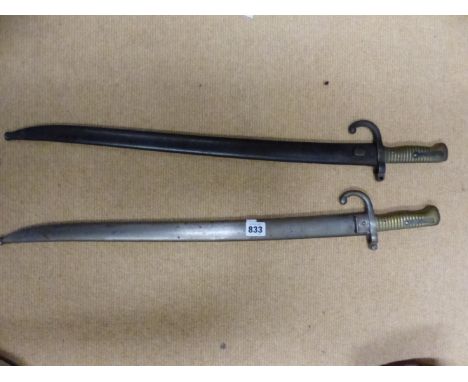 A FRENCH MODEL 1866 SABRE OR CHASSEPOT BAYONET DATED 1869, TOGETHER WITH ANOTHER SIMILAR UNMARKED GERMAN ERSATZ EXAMPLE (?) W