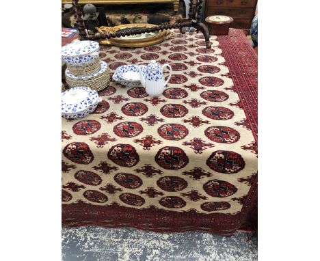 A TEKKE BOKHARA CARPET. 305 x 215cms