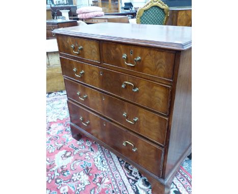 A GEORGIAN&nbsp; MAHOGANY CHEST OF TWO SHORT AND THREE GRADED LONG DRAWERS, EACH WITH BRASS HANDLES AND ABOVE THE BRACKET FEE
