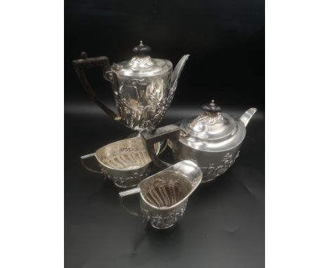 A four piece silver tea set comprising coffee pot, tea pot, milk jug and sugar bowl, 1424gms, Sheffield 1922. Estimate: £580-