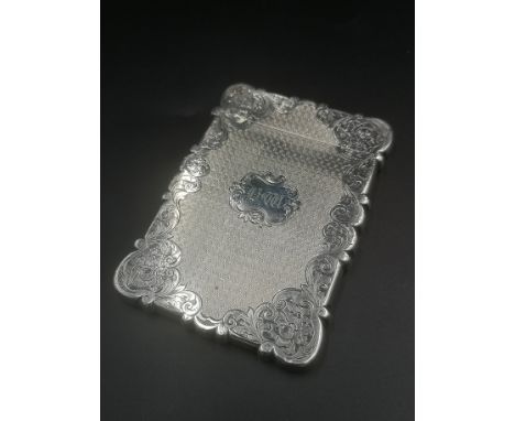 Victorian silver card case with engine turned and scroll decoration, Birmingham 1852, 9.5 x 7cms, 68gms. Estimate: £80-120