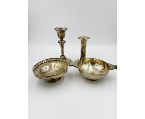 Silver candlestick hallmarked Chester 1921, height 14.5cms, 213gms (weighted bottom); silver columned candlestick hallmarked 