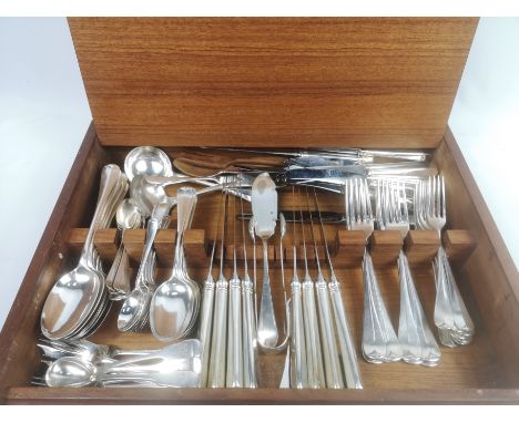 A teak canteen containing a quantity of principally Old English pattern silver plate cutlery: nine tablespoons; nine dessert 