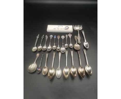 Five silver spoons, Birmingham 1934, together with a quantity of silver tea spoons to include some marked 800, total weight 3