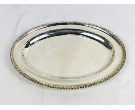 Silver dish with gadrooned edge, 575g, Birmingham 1924, 29.5cms. Estimate £240-260