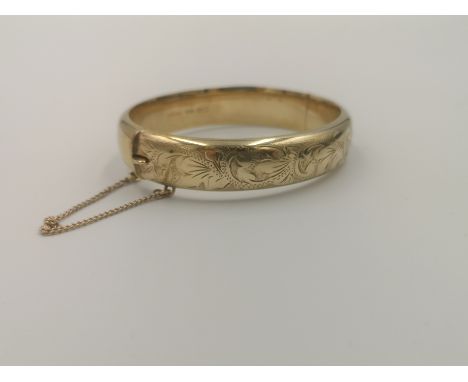 9ct gold bangle, marked Excalibur, 19.5g. Estimate: £270-300