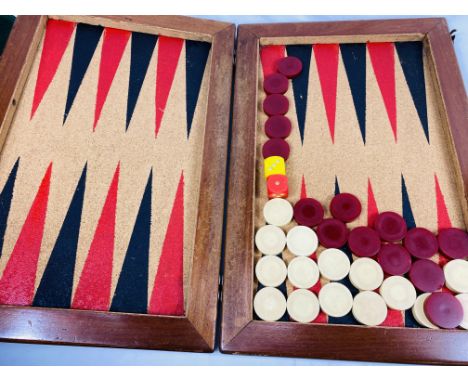 Folding backgammon board with counters and dice with cork interior, written to front Coombe Hill Golf Club, 36 x 86cms. Estim