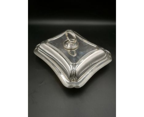 Silver entree dish, London 1929, 1524gms. Estimate: £620-650