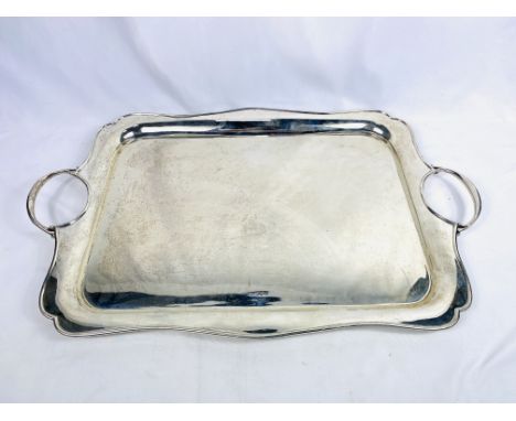 Two handled tray silver tray, 66 x 42.5cms, 3720g, Sheffield 1922. Estimate: £1,550-1,600