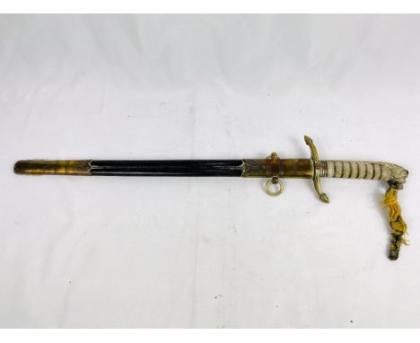 Early 20th century naval officers dress sword with leather and brass scabbard, total length 63cm. Estimate: £70-100