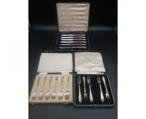 Boxed set of six silver and hand painted enamel tea spoons, 61g, Birmingham 1966; together with a set of six silver handled b