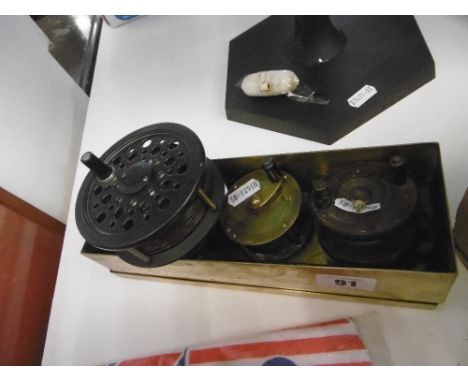 THREE VINTAGE FISHING REELS AND ONE MODERN PLUS BOX AND BRASS SCALES
