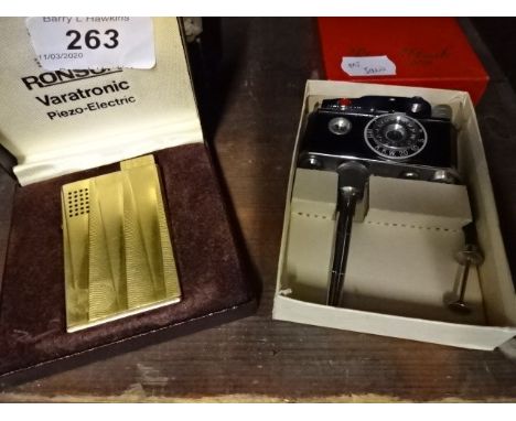 Ronson Varatronic boxed lighter plus novelty camera lighter