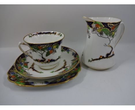 Around 30 pieces of decorative hand painted china, mostly cups and saucers, plus box of cheese dishes etc