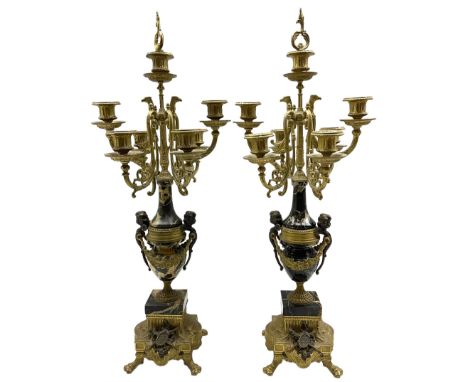 Pair late 19th century six branch table candelabra, the branches cast with Griffon heads and ornate foliate scrolls, the cent