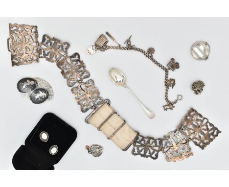 A SELECTION OF JEWELLERY AND AN EPNS NURSES BELT, to include a white metal charm bracelet fitted with seven charms, unmarked,