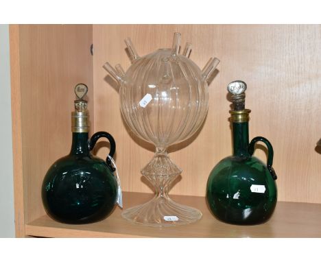 TWO VICTORIAN GREEN GLASS DECANTERS AND A CIRCA 1980s STUDIO GLASS FLOWER STEM VASE / TULIPIERE?, the decanters with metal mo