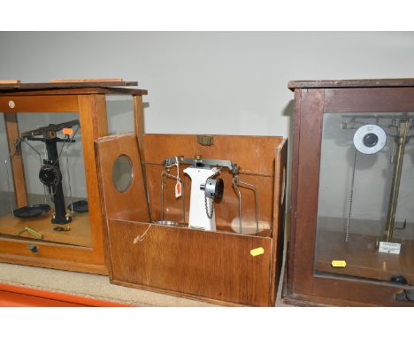 THREE SETS OF SCIENTIFIC SCALES, comprising an Oertling model J10 set of scales with case (case in need of attention, some we