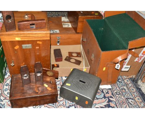 A GROUP OF EMPTY WOODEN INSTRUMENT CASES, comprising seven assorted cases, a brown leather AVO case, in industrial speaker, e