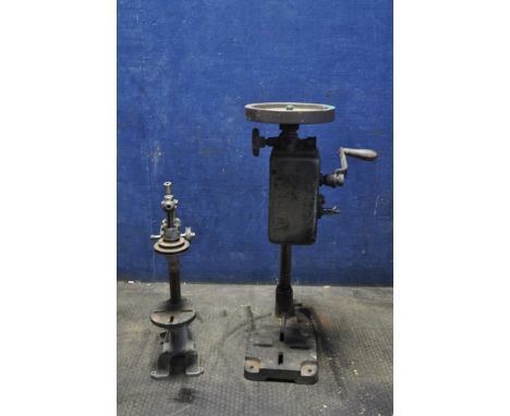 TWO VINTAGE DRILL PRESSES, the first with a geared hand crank and chuck height 60cm, and a belt driven with adjustable table 