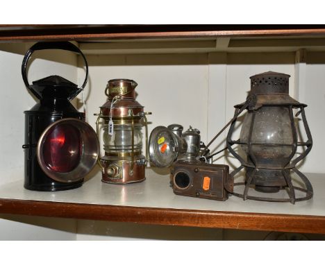 FOUR TRANSPORT RELATED LAMPS, comprising a copper and brass ships lantern by G. Bocock of Birmingham dated 1942 - lacks burne