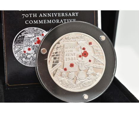 A CASED SILVER PROOF CROWN COIN, this London Mint Office coin commemorating the D-Day Landings 70th anniversary, dated 2014, 