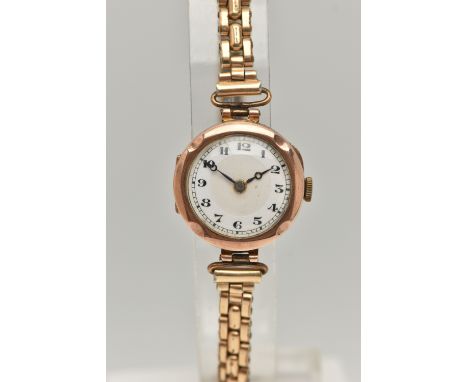 A LADIES 9CT GOLD WRISTWATCH, manual wind, round white dial, Arabic numerals, blue steel hands, in a polished case, inside ca