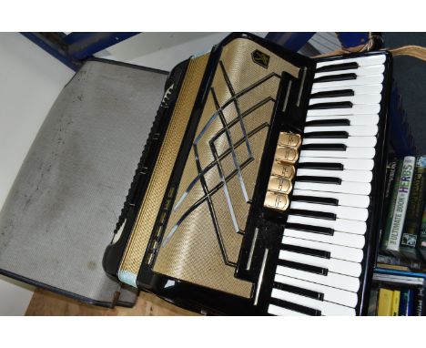 A CASED HOHNER VIRTUOLA III 'PIANO ACCORDION', in black finish with 120 bass and 5 treble couplers, in hard vintage case (1 +