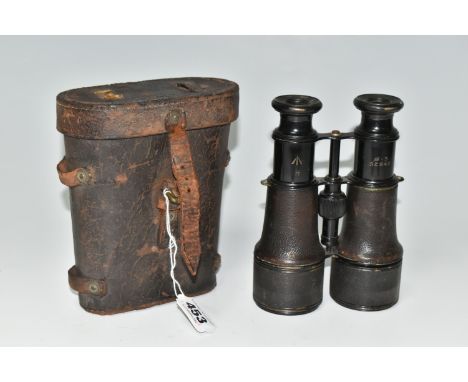 A PAIR OF WW1 BRITISH MILITARY ISSUE BINOCULARS ENGRAVED WITH A BROAD ARROW, also engraved with numbers and letters to the ca