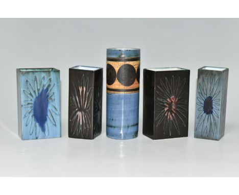 FIVE SMALL TROIKA VASES, comprising four early rectangular slab vases decorated with a wax resist daisy-like flower on each s