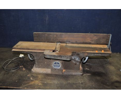 A VINTAGE WALKER-TURNER BENCH JOINTER  with 6in cut, 34in bed, 240v 'The Cub' motor, adjustable fence (PAT fail due to uninsu