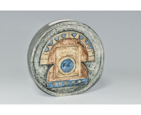 A TROIKA POTTERY 16CM WHEEL VASE, in shades of blue, cream and brown, with relief, impressed and incised decoration, signed t
