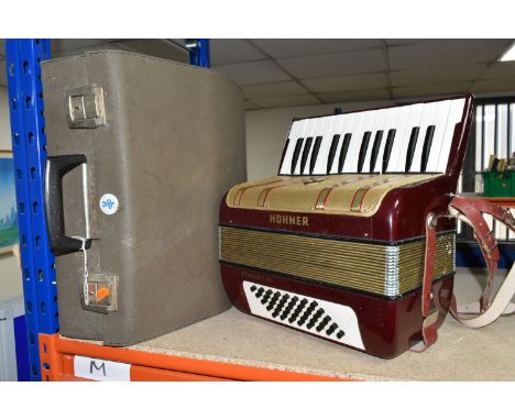 A HOHNER TWENTY-SIX KEY PIANO ACCORDION, 'Starlet 40' model with hard case, untested