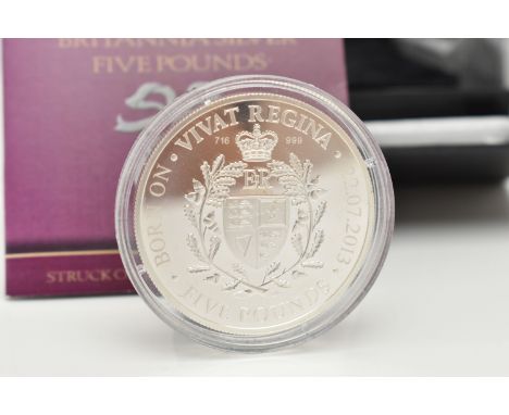 A COMMEMORATIVE SILVER FIVE POUND COIN, The London Mint Office coin dated 2013 to commemorate the birth of Prince George, in 