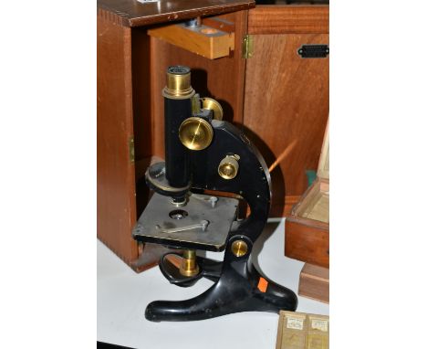A CASED MICROSCOPE AND VINTAGE PREPARED SLIDES, comprising a B &amp; J Beck Ltd cased microscope, and two boxes containing a 