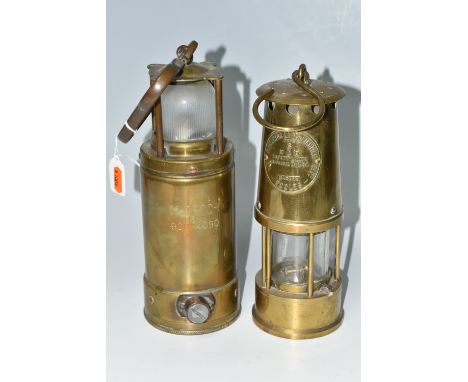 TWO BRASS LAMPS, a McGeoch 0583 900-4090 brass lamp with looped hook handle, possibly a submarine/ship's lamp, height excludi