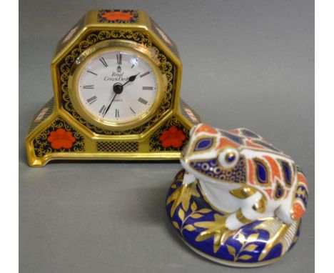 A Royal Crown Derby Porcelain Table Clock decorated in the Imari Palette, together with a similar Royal Crown Derby Decanter 