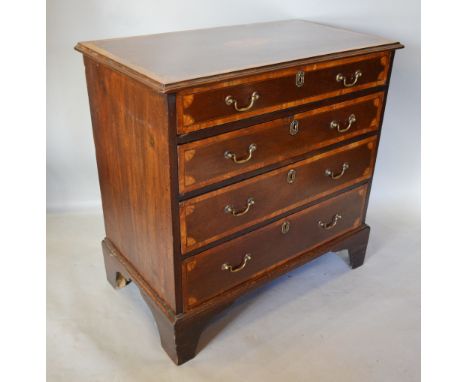A 19th Century Mahogany Satinwood Inlaid Chest, the crossbanded shell inlaid top above four long drawers with brass swan neck
