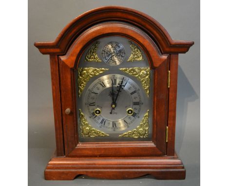 A Reproduction Dome Shaped Bracket Clock, the silvered dial with Roman and Arabic numerals and two train movement, 36 cms tal