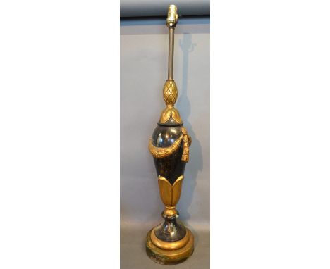 A Regency Style Gilded and Ebonised Large Table Lamp, decorated bows and swags, 90 cms tall