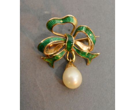 A 14ct. Gold Enamel Decorated Brooch in the form of a Bow with drop pearl