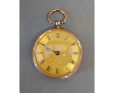 A 9ct. Gold Cased Pocket Watch with Foliate Engraved Dial