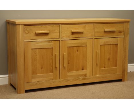 Light oak sideboard, three drawers above three cupboards, W151cm, H82cm, D48cm   Condition Report   Click here for further im