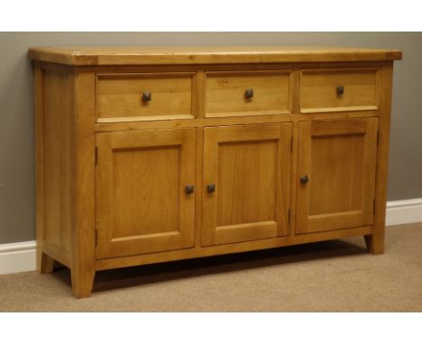 Light oak sideboard, three drawers above three cupboards, W150cm, H89cm, D46cm   Condition Report   Click here for further im