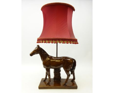 Large pottery lamp, modelled as a horse on rectangular base, L40cm x H37cm of horse   Condition Report   Click here for furth