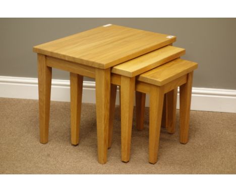 Nest of three light oak tables, W55cm, H40cm, D46cm   Condition Report   Click here for further images, condition, auction ti