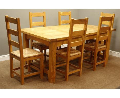 Rectangular ash dining table on stretcher base (180cm x 100cm, H78cm), and set six light oak ladder back dining chairs with r