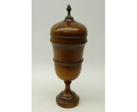 19th century turned mahogany pedestal urn with cover and brass pinecone finial, H43cm   Condition Report   Click here for fur