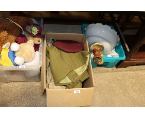 A box containing various uniforms including Dessert Service bush jackets, battle dress blouse and other jackets 